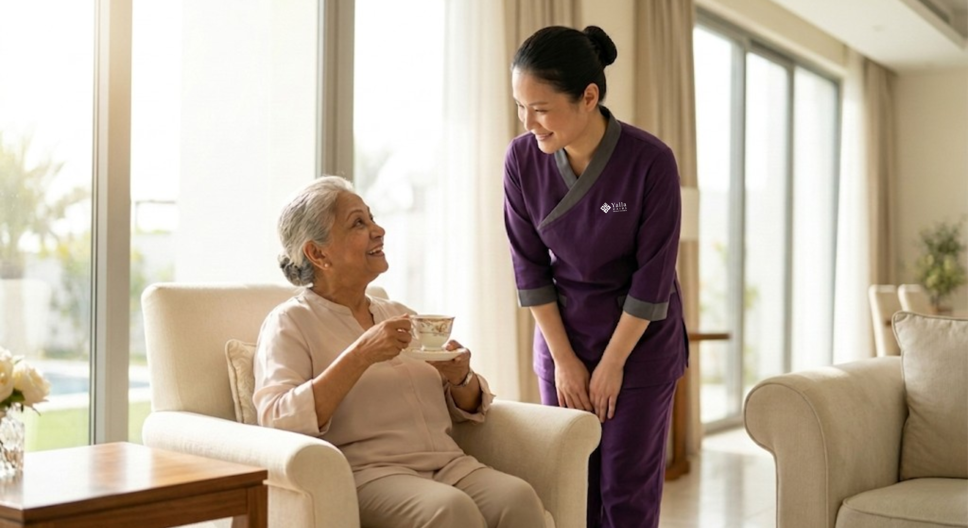 Retiree with caregiver under a maid visa in Dubai.