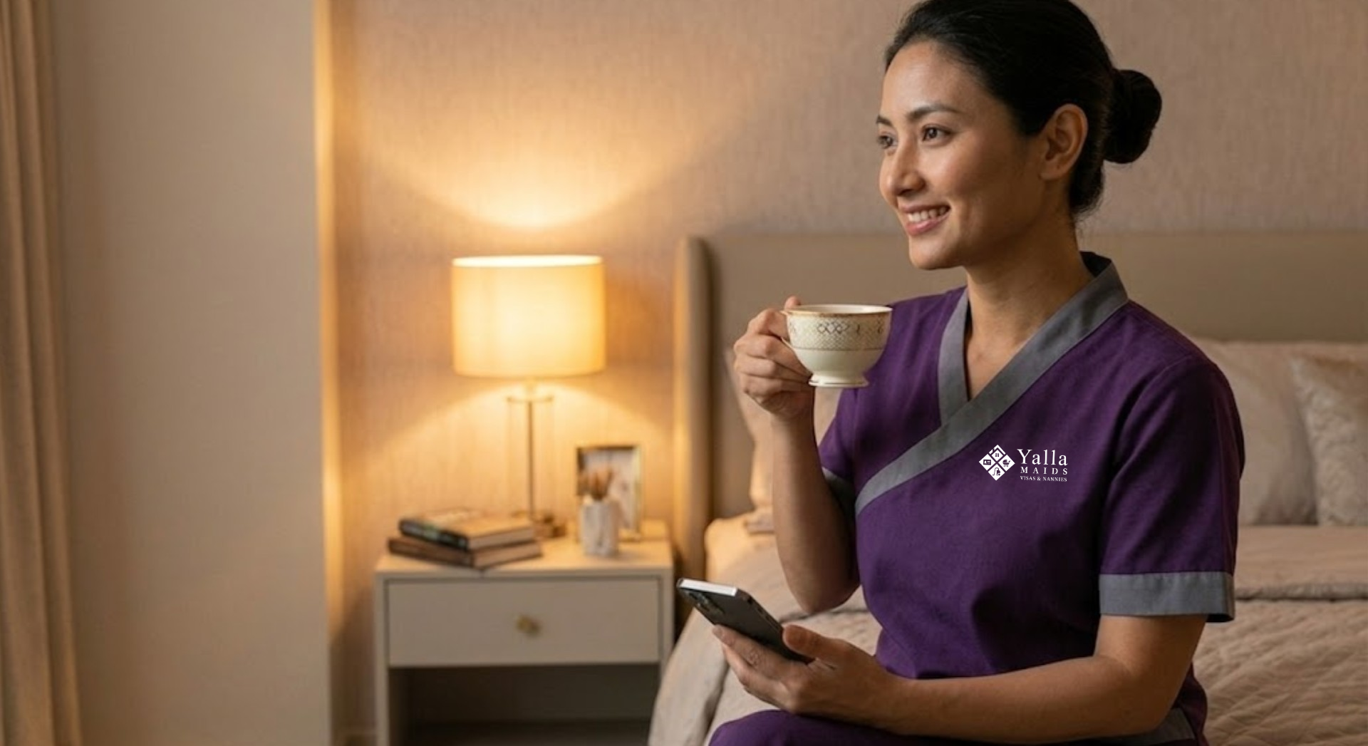 Professional caregiver relaxing at home after families hire a maid in Dubai.