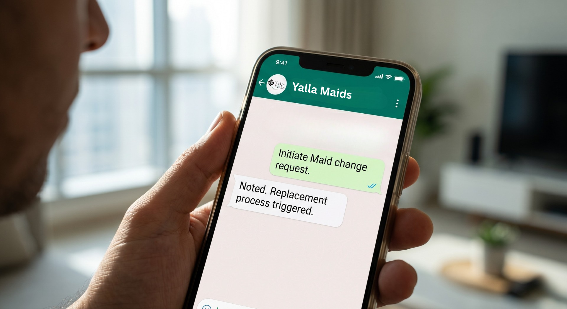 Customer using a mobile app to hire a maid in Dubai.